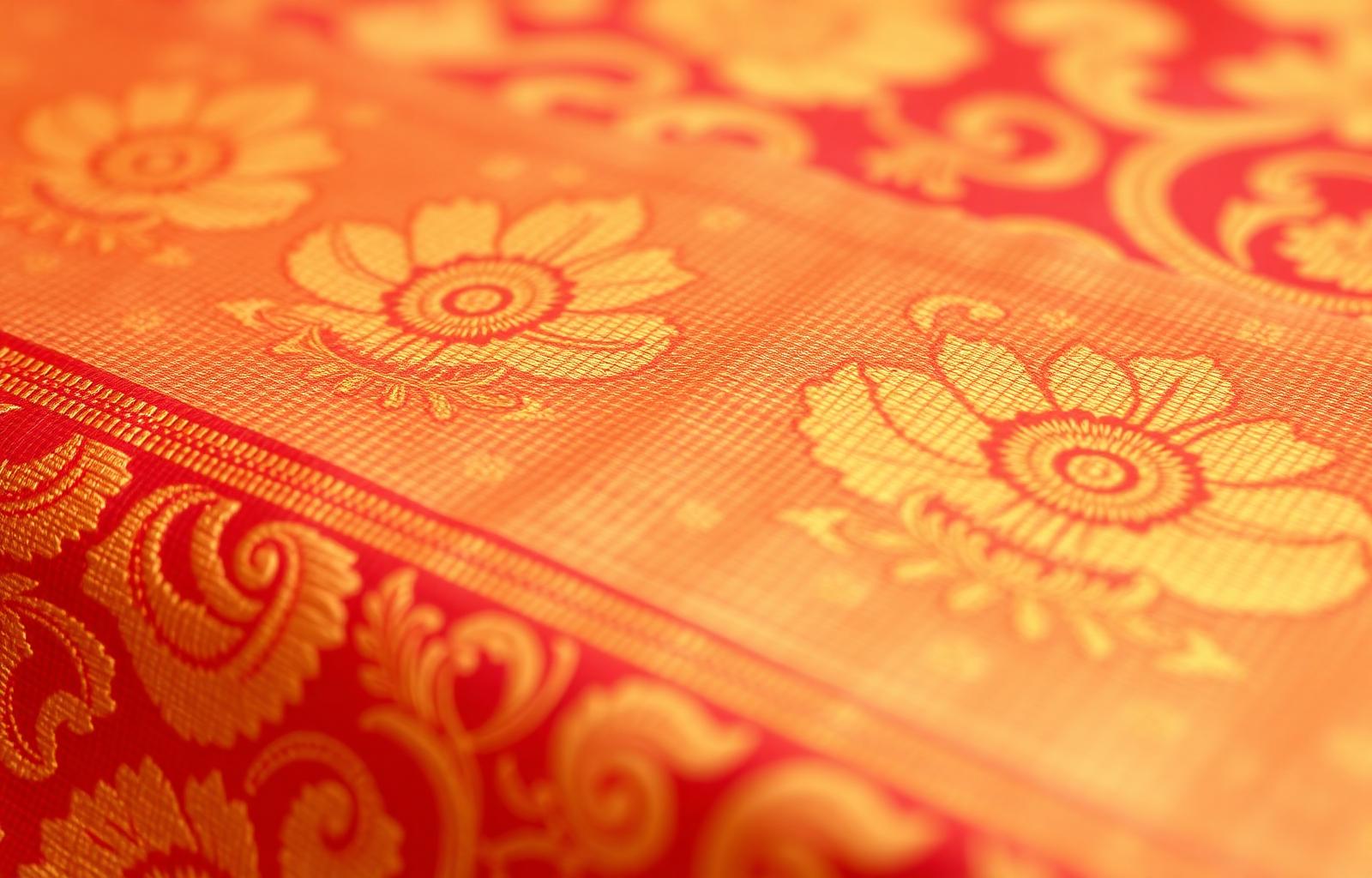 Macro of woven Jacquard silk with gold zari